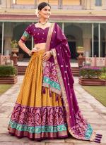 Tussar Silk Mustard Traditional Wear Foil Printed Lehenga Choli